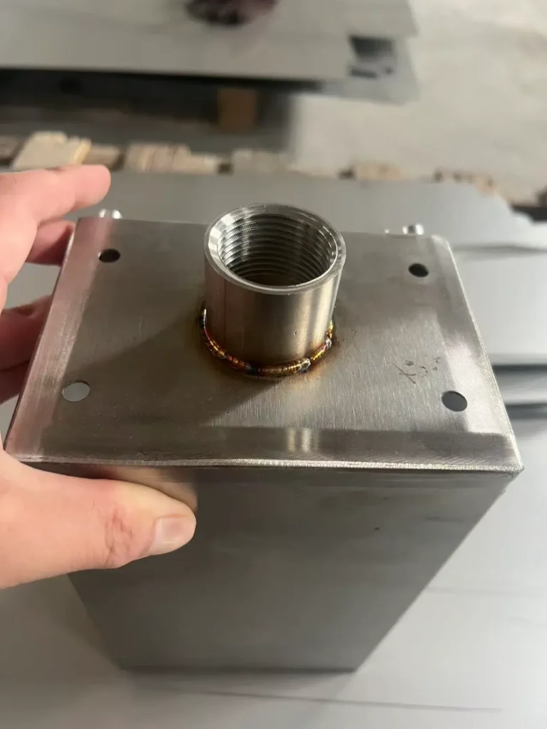 Precision welding seam on electrical enclosure panel ensuring strong structure and clean finish